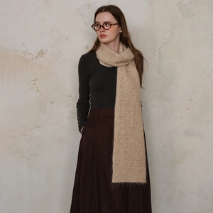 Elegant beige diamond knit scarf styled with autumn winter outfit for women