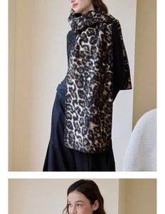 Close-up of leopard print wool blend scarf with premium stitched edges and thick texture