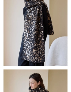 Close-up of leopard print scarf showing thick texture and clean hemmed edge detail