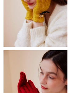 Detail of wool blend knit gloves with elegant bow tie, buttons and touchscreen fingertips