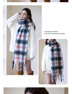 Detailed view of pink and grey plaid scarf with soft fringe and thick cashmere feel