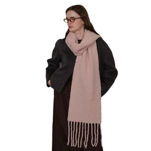 Pink wool-blend knit scarf with tassel fringe for winter warmth and soft texture style