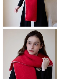 Macro detail of red winter scarf featuring premium white triangle stitched edge design