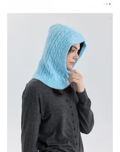 Detailed side view of light blue cable knit balaclava hood with soft textured pattern