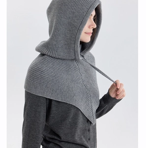 Detailed close-up of grey chunky knit hooded scarf showing premium texture and drawstring