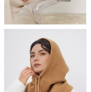 Detail of camel knitted balaclava with drawstring showing fine texture and winter style