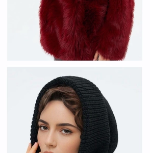 Detail view of burgundy plush faux fur texture and black chunky knit balaclava hood