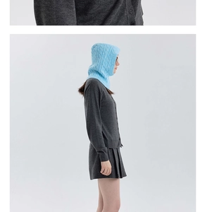 Detail view of sky blue wool blend cable knit balaclava hood with soft textured finish