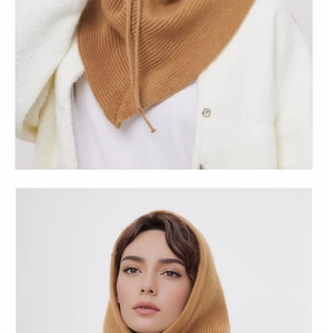 Detail of camel knit balaclava showing soft texture, drawstring hood and neck protection