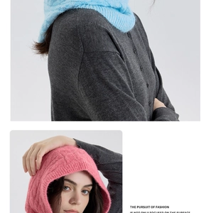 Detail of cable knit wool blend balaclava hat in sky blue and pink pastel colors