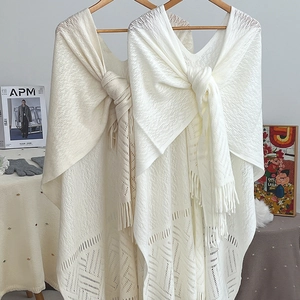 Elegant white knitted hollow shawl with fringe tassels for casual or formal layering