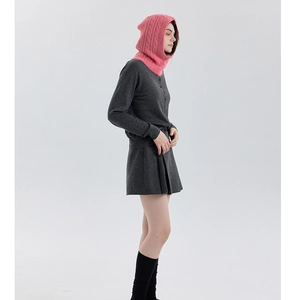 Detail view of pink wool blend cable knit balaclava hood with soft woven texture