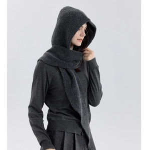 Detail view of dark grey knitted hooded scarf featuring a fine vertical ribbed texture