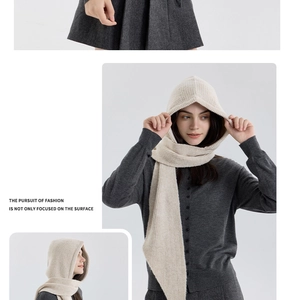 Detail view of beige ribbed knit hooded scarf showing premium wool blend texture and style