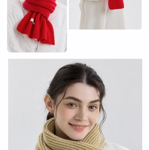 Detailed macro view of heavy knit texture on soft cashmere-like red and beige scarves
