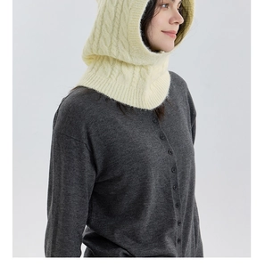 Detailed knit pattern of beige balaclava wool blend hood with cable stitch texture