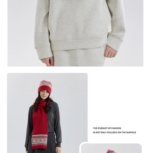 Detailed knit pattern of a red Fair Isle scarf and beanie with Nordic geometric textures