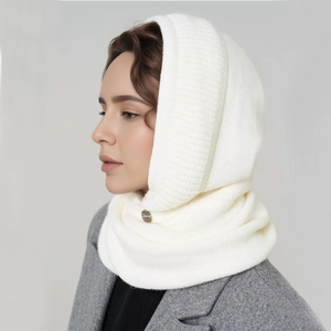 Winter white knitted balaclava with decorative silver button and cozy neck warmer