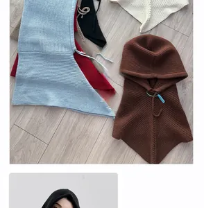 Detailed view of knitted Balaclava hoods in multiple colors with drawstring closure