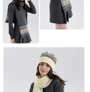 Close-up of Fair Isle knit texture and Nordic geometric pattern on warm winter scarf