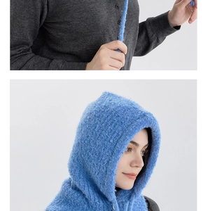 Detailed knit texture of navy wool blend balaclava with soft mohair yarn for winter