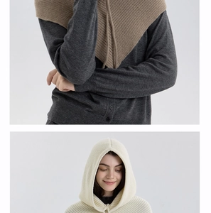 Detail of ribbed knit texture on balaclava hood with drawstring for winter warmth