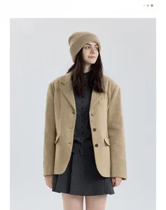 Detail of light khaki double-layered thick wool knit beanie with vertical ribbed texture