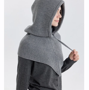 Close-up of gray ribbed knit balaclava showing thick windproof texture and drawstring detail
