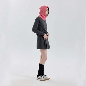 Pink wool blend cable knit balaclava hood scarf shown on a model in full body view
