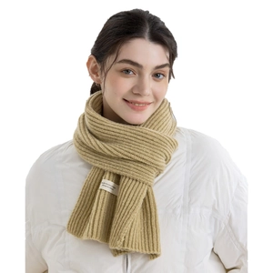 Chic mustard yellow knitted scarf with soft cashmere-like texture and minimal white label