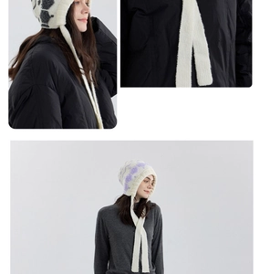 Detail view of winter knitted aviator hats with soft strings and checkerboard patterns