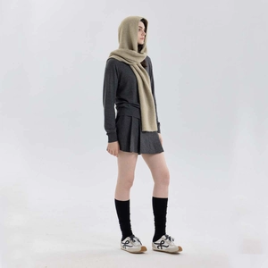 Women's khaki hooded knit scarf and balaclava set shown on a model from a side profile