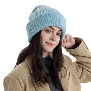 Thick light blue wool knit beanie with double layers and ribbed texture for winter warmth