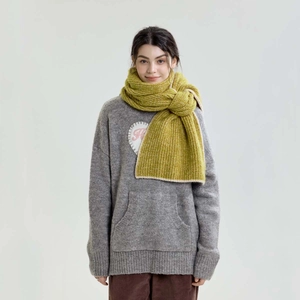 Grass green chunky knit scarf with thick striped texture for winter warmth
