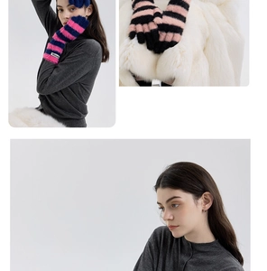 Close-up of thick striped plush knit gloves with soft faux mink fur and woven wrist label