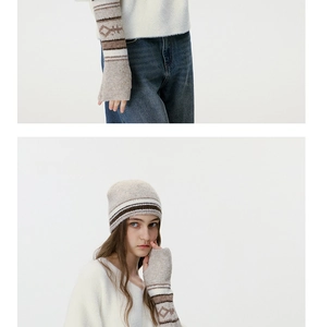 Dettaglio del set berretto in maglia retrò e manicotti coordinati con motivo jacquard
