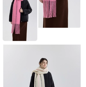Detail of pink and striped beige mohair scarf with thick texture and long tassels
