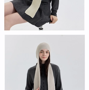 Detail view of beige knitted balaclava hood scarf with classic vertical rib pattern