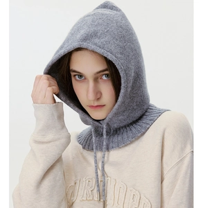 Close-up of gray knit balaclava hood with adjustable drawstrings and soft texture