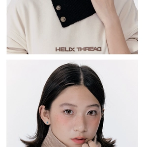 Detail of waffle knit texture and three-button collar design on a warm neck gaiter
