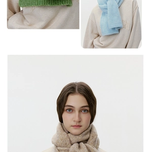 Detail of wool knit scarves in green, blue, and oat colors with thick ribbed texture