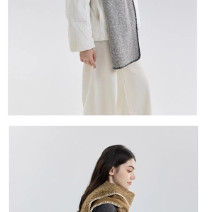 Detail of the knit scarves showing textured wool blend with decorative blanket stitching
