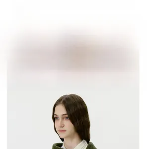 Detailed knit texture and wrap-around style of a dark green winter buttoned neck warmer