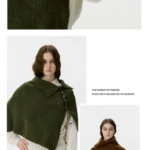 Detailed view of the chunky knit texture and stylish button accents on the knit shawl