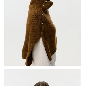 Close-up of caramel knit shawl featuring five delicate side buttons and chunky texture