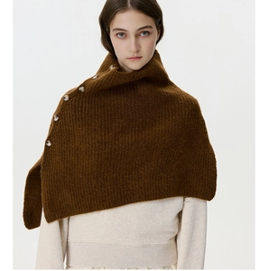 Detail shot of heavy-knit brown neck warmer featuring retro side button closures