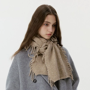 Elegant beige wool blend knit scarf with fringe tassels for winter warmth and comfort