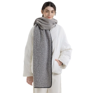 Thick dark gray wool-like scarf with black blanket stitch edges for winter warmth