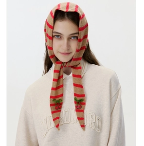 Detail of wool knit headscarf with red stripes and beaded cherry embroidery accents