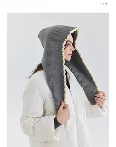 Gray knitted balaclava with cream ruffled trim for winter neck and head warmth